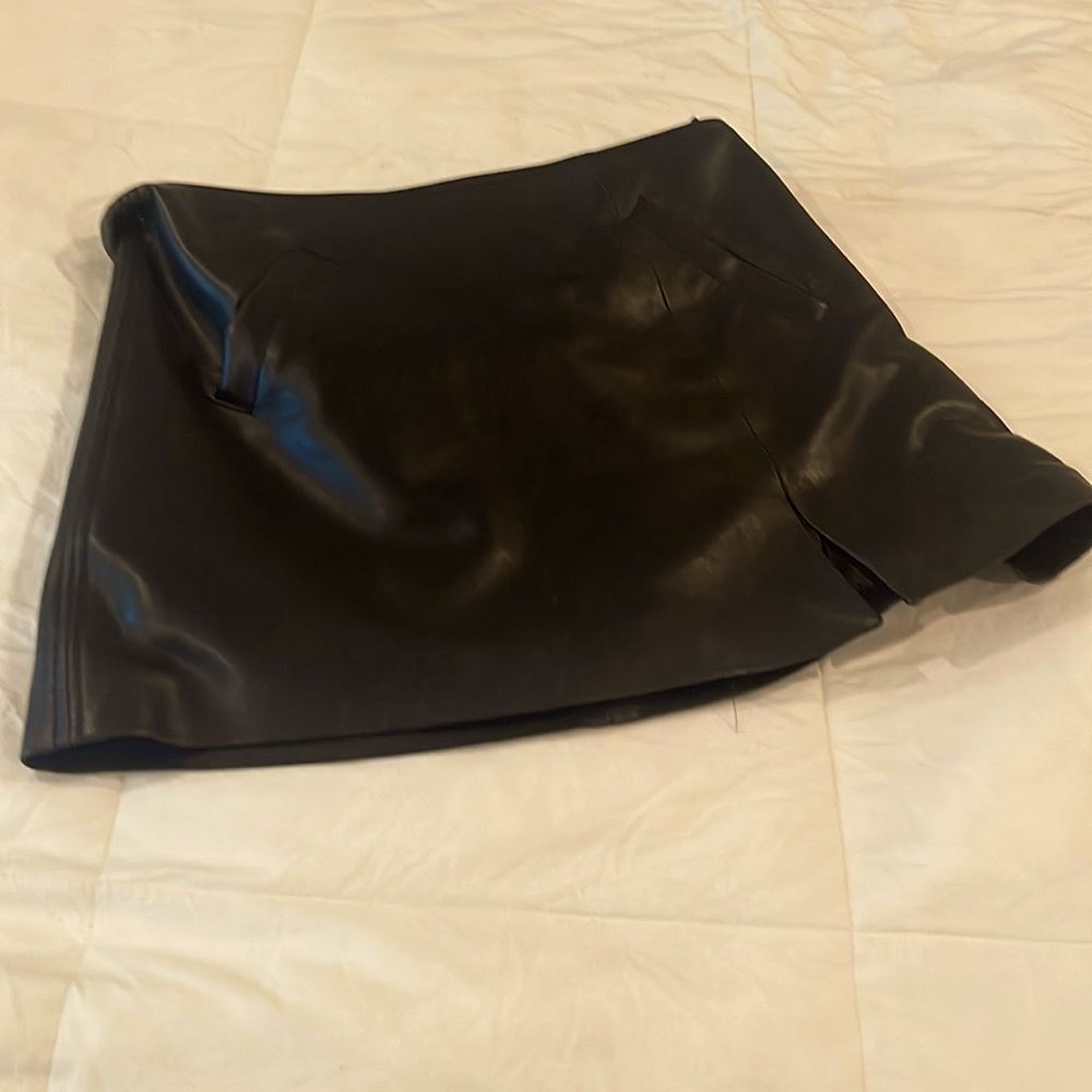 Black mini skirt by blank and YC in size 28.